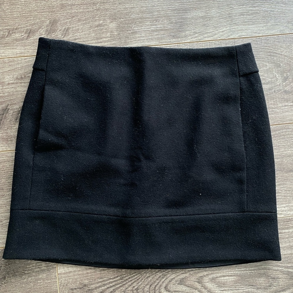 J. Crew black wool blend, lined mini skirt with zipper in back and front pockets